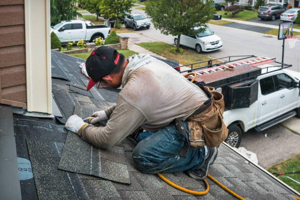 Professional Flat Roof Repair technician working in Garibaldi, OR